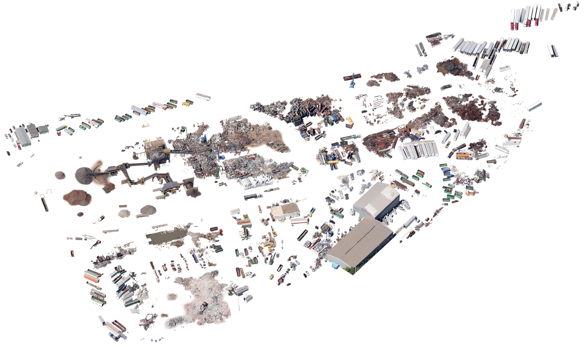 Isolated satellite imagery of a metal recycling plant, with piles of waste material and shipping containers