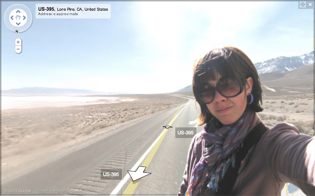 Jenny Odell appearing to take a selfie with Street View of mountains and a lake photoshopped into the background