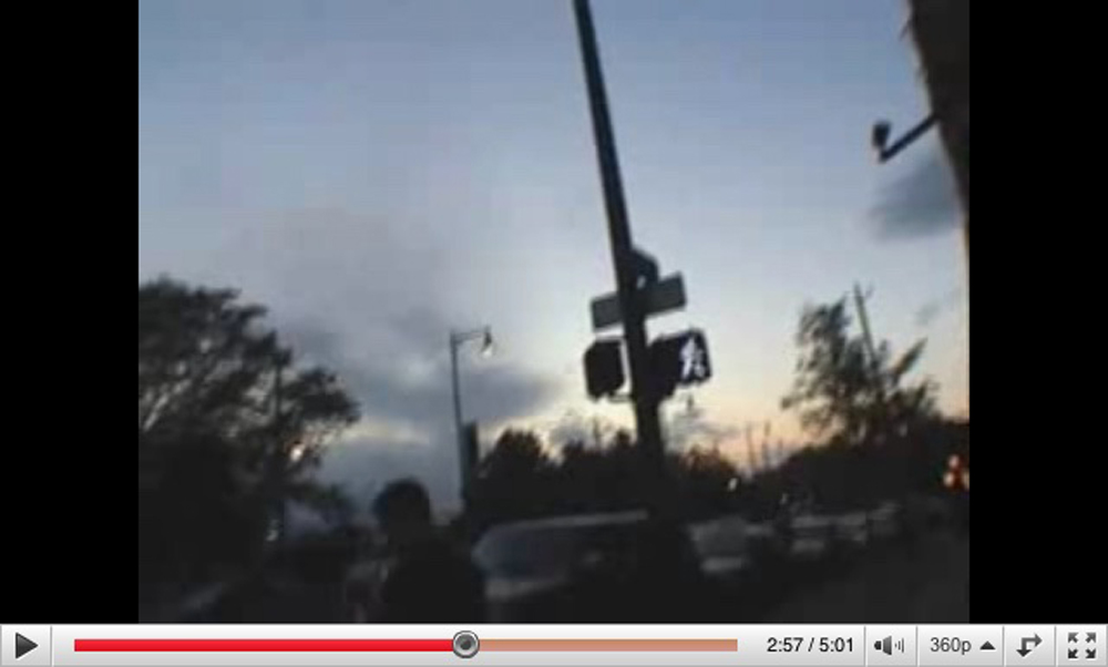 Screen shot from a Youtube video of people walking in Denver